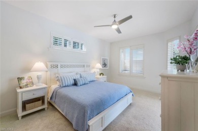 Immerse yourself in the ultimate expression of luxury living at on Shadow Wood Country Club in Florida - for sale on GolfHomes.com, golf home, golf lot