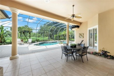 Immerse yourself in the ultimate expression of luxury living at on Shadow Wood Country Club in Florida - for sale on GolfHomes.com, golf home, golf lot
