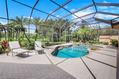Immerse yourself in the ultimate expression of luxury living at on Shadow Wood Country Club in Florida - for sale on GolfHomes.com, golf home, golf lot