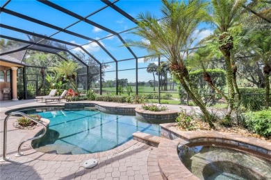 Immerse yourself in the ultimate expression of luxury living at on Shadow Wood Country Club in Florida - for sale on GolfHomes.com, golf home, golf lot