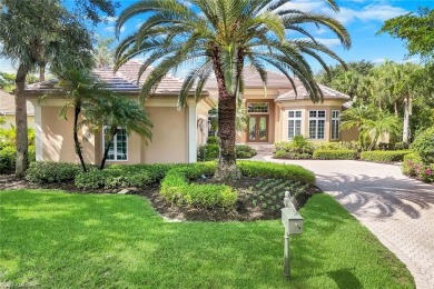 Immerse yourself in the ultimate expression of luxury living at on Shadow Wood Country Club in Florida - for sale on GolfHomes.com, golf home, golf lot