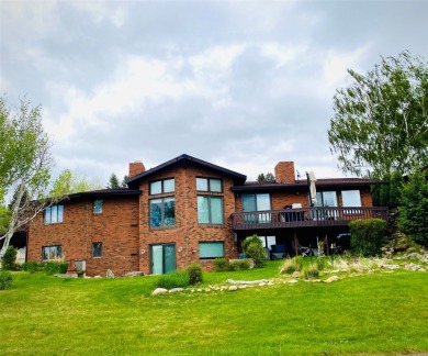 Wake up in the morning and sit on the front deck with your on Eagle Falls Golf Club in Montana - for sale on GolfHomes.com, golf home, golf lot