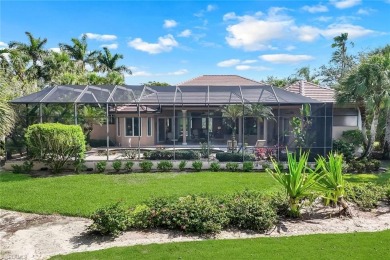 Immerse yourself in the ultimate expression of luxury living at on Shadow Wood Country Club in Florida - for sale on GolfHomes.com, golf home, golf lot
