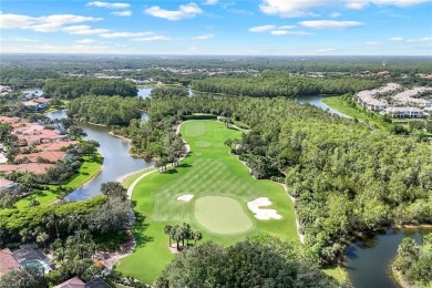 Immerse yourself in the ultimate expression of luxury living at on Shadow Wood Country Club in Florida - for sale on GolfHomes.com, golf home, golf lot