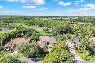 Immerse yourself in the ultimate expression of luxury living at on Shadow Wood Country Club in Florida - for sale on GolfHomes.com, golf home, golf lot