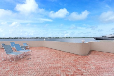 This spacious 7th-floor condo offers sweeping, unobstructed on North Palm Beach Country Club in Florida - for sale on GolfHomes.com, golf home, golf lot