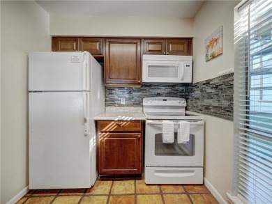 Experience waterfront living in this 3-bedroom, 2-bathroom condo on Padre Isles Golf Course in Texas - for sale on GolfHomes.com, golf home, golf lot