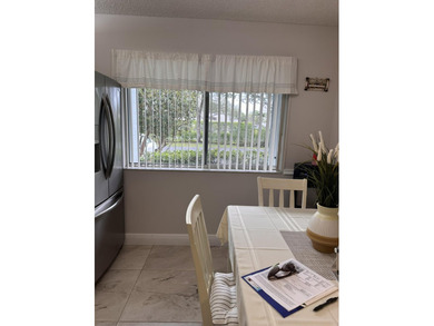 Great 1.444 sf unit on first floor 2/2 plus a bonus room that on Poinciana Golf Club in Florida - for sale on GolfHomes.com, golf home, golf lot