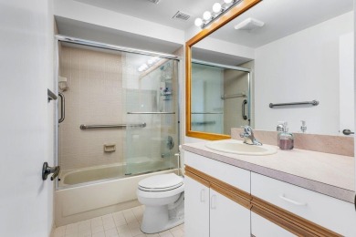 Welcome to 605 Club Drive--a light-filled 2-bedroom, 2-bath on PGA National Golf Club in Florida - for sale on GolfHomes.com, golf home, golf lot