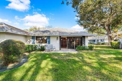 Welcome to 605 Club Drive--a light-filled 2-bedroom, 2-bath on PGA National Golf Club in Florida - for sale on GolfHomes.com, golf home, golf lot