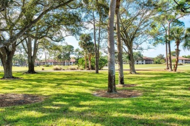 Welcome to 605 Club Drive--a light-filled 2-bedroom, 2-bath on PGA National Golf Club in Florida - for sale on GolfHomes.com, golf home, golf lot