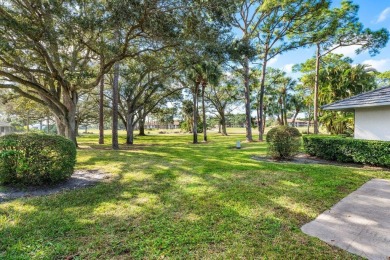 Welcome to 605 Club Drive--a light-filled 2-bedroom, 2-bath on PGA National Golf Club in Florida - for sale on GolfHomes.com, golf home, golf lot