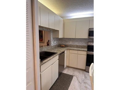 Great 1.444 sf unit on first floor 2/2 plus a bonus room that on Poinciana Golf Club in Florida - for sale on GolfHomes.com, golf home, golf lot