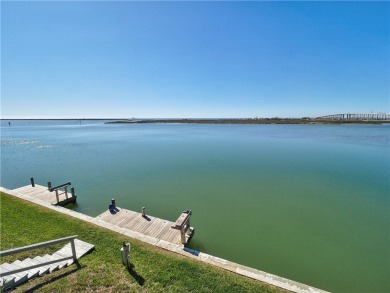 Experience waterfront living in this 3-bedroom, 2-bathroom condo on Padre Isles Golf Course in Texas - for sale on GolfHomes.com, golf home, golf lot