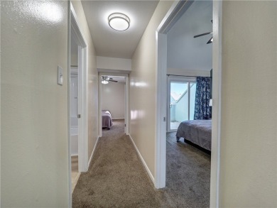 Experience waterfront living in this 3-bedroom, 2-bathroom condo on Padre Isles Golf Course in Texas - for sale on GolfHomes.com, golf home, golf lot