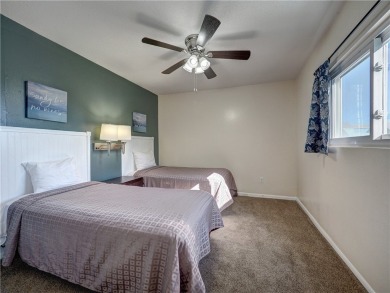 Experience waterfront living in this 3-bedroom, 2-bathroom condo on Padre Isles Golf Course in Texas - for sale on GolfHomes.com, golf home, golf lot