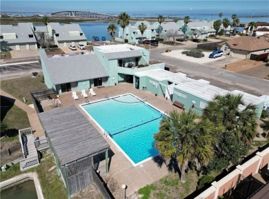 Experience waterfront living in this 3-bedroom, 2-bathroom condo on Padre Isles Golf Course in Texas - for sale on GolfHomes.com, golf home, golf lot