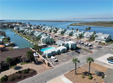 Experience waterfront living in this 3-bedroom, 2-bathroom condo on Padre Isles Golf Course in Texas - for sale on GolfHomes.com, golf home, golf lot
