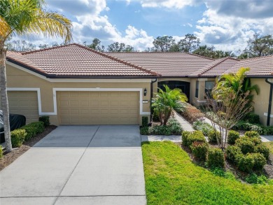 Welcome home! Nestled in the serene, active 55+ community of Del on Apollo Beach Golf and Sea Club in Florida - for sale on GolfHomes.com, golf home, golf lot