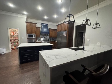 Welcome to an exquisite home in Northwood subdivision at Lake on Lake Fork Golf Club - Rains County in Texas - for sale on GolfHomes.com, golf home, golf lot