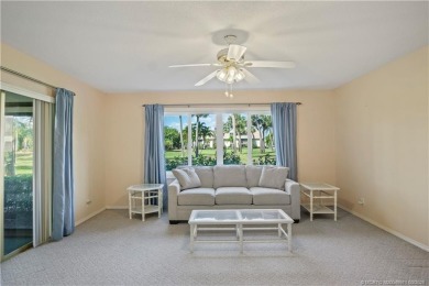 Enjoy first floor living with fantastic views from every room on Martin County Golf Course in Florida - for sale on GolfHomes.com, golf home, golf lot