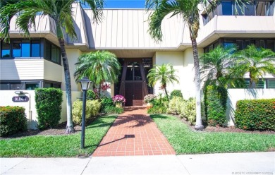 Enjoy first floor living with fantastic views from every room on Martin County Golf Course in Florida - for sale on GolfHomes.com, golf home, golf lot