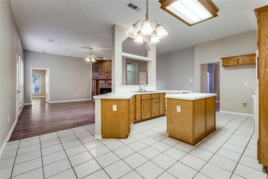 Welcome to this beautifully updated one story 4 BR, 2 BA home on Firewheel Golf Park in Texas - for sale on GolfHomes.com, golf home, golf lot