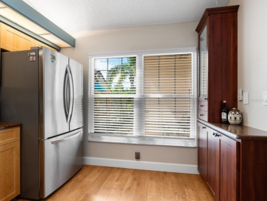 Welcome to this updated residence in Clubside at Palm-Aire on University Park Country Club in Florida - for sale on GolfHomes.com, golf home, golf lot