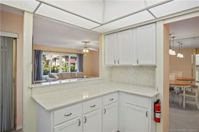 Enjoy first floor living with fantastic views from every room on Martin County Golf Course in Florida - for sale on GolfHomes.com, golf home, golf lot