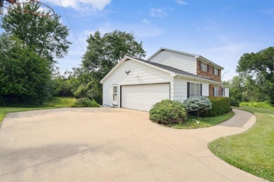 HOME WITH EXTRA LOT! .87 acres total bordering Bunker Hill Golf on Bunker Hill Golf Course in Iowa - for sale on GolfHomes.com, golf home, golf lot