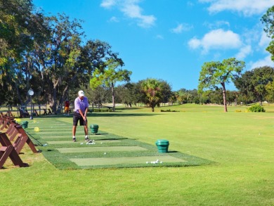 Welcome to this updated residence in Clubside at Palm-Aire on University Park Country Club in Florida - for sale on GolfHomes.com, golf home, golf lot