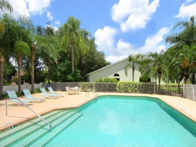 Welcome to this updated residence in Clubside at Palm-Aire on University Park Country Club in Florida - for sale on GolfHomes.com, golf home, golf lot