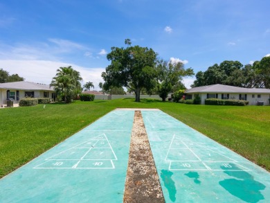 Welcome to this updated residence in Clubside at Palm-Aire on University Park Country Club in Florida - for sale on GolfHomes.com, golf home, golf lot