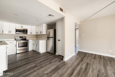 Beautifully updated 2-bedroom, 1-bath ground floor corner unit on Scottsdale Shadows in Arizona - for sale on GolfHomes.com, golf home, golf lot