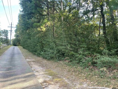 Build your dream home on this beautiful, heavily wooded 0 on Holly Lake Ranch Golf Club in Texas - for sale on GolfHomes.com, golf home, golf lot