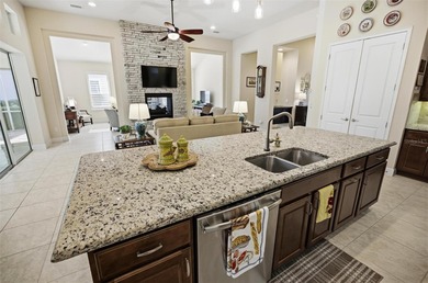 Discover this thoughtfully designed Cameron floor plan perfectly on Plantation Bay Golf and Country Club in Florida - for sale on GolfHomes.com, golf home, golf lot