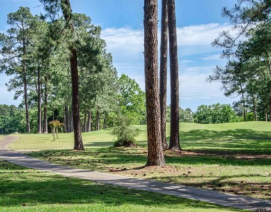 Build your dream home on this beautiful, heavily wooded 0 on Holly Lake Ranch Golf Club in Texas - for sale on GolfHomes.com, golf home, golf lot