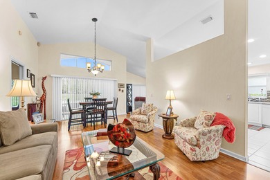 Pride of ownership shines in this immaculate, well-maintained on Cypress Lakes Golf Course - West Palm Beach in Florida - for sale on GolfHomes.com, golf home, golf lot