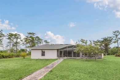 MUST SEE 4/2 POOL home sitting on 1.24 acres!  This well on Wedgefield Golf Club in Florida - for sale on GolfHomes.com, golf home, golf lot