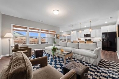 This stunning home features an open floor plan with a fantastic on The Tillery Tradition Country Club in North Carolina - for sale on GolfHomes.com, golf home, golf lot