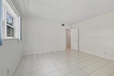 Sunny, Spectacular 55+ Condo w/Prime Location for the Ultimate on Eco Golf Club in Florida - for sale on GolfHomes.com, golf home, golf lot