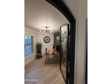 This beautiful home blends modern upgrades with resort-style on Tuscany Falls At Pebble Creek in Arizona - for sale on GolfHomes.com, golf home, golf lot