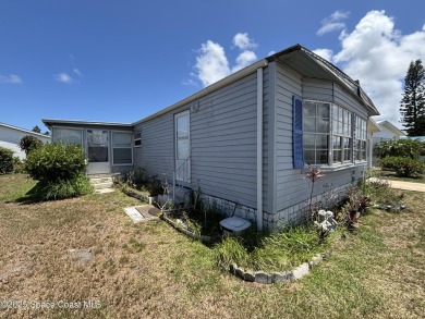 Residential or Investor Opportunity. This classic 2-bedroom, 2 on Barefoot Bay Golf Course in Florida - for sale on GolfHomes.com, golf home, golf lot