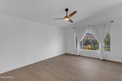 This beautiful home blends modern upgrades with resort-style on Tuscany Falls At Pebble Creek in Arizona - for sale on GolfHomes.com, golf home, golf lot