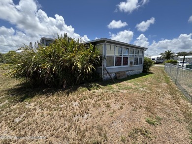 Residential or Investor Opportunity. This classic 2-bedroom, 2 on Barefoot Bay Golf Course in Florida - for sale on GolfHomes.com, golf home, golf lot