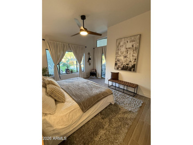 This beautiful home blends modern upgrades with resort-style on Tuscany Falls At Pebble Creek in Arizona - for sale on GolfHomes.com, golf home, golf lot