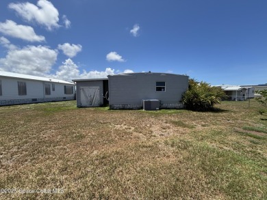 Residential or Investor Opportunity. This classic 2-bedroom, 2 on Barefoot Bay Golf Course in Florida - for sale on GolfHomes.com, golf home, golf lot