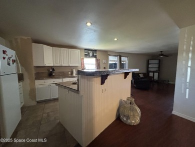 Residential or Investor Opportunity. This classic 2-bedroom, 2 on Barefoot Bay Golf Course in Florida - for sale on GolfHomes.com, golf home, golf lot