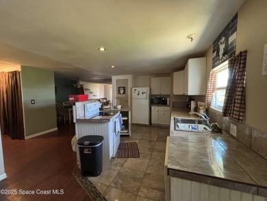 Residential or Investor Opportunity. This classic 2-bedroom, 2 on Barefoot Bay Golf Course in Florida - for sale on GolfHomes.com, golf home, golf lot