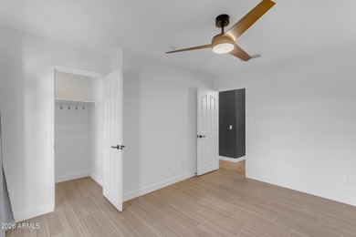 This beautiful home blends modern upgrades with resort-style on Tuscany Falls At Pebble Creek in Arizona - for sale on GolfHomes.com, golf home, golf lot